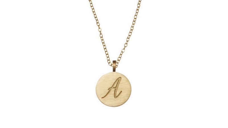 9kt Gold initial disc necklace, €198, Loulerie, Chatham St, Dublin