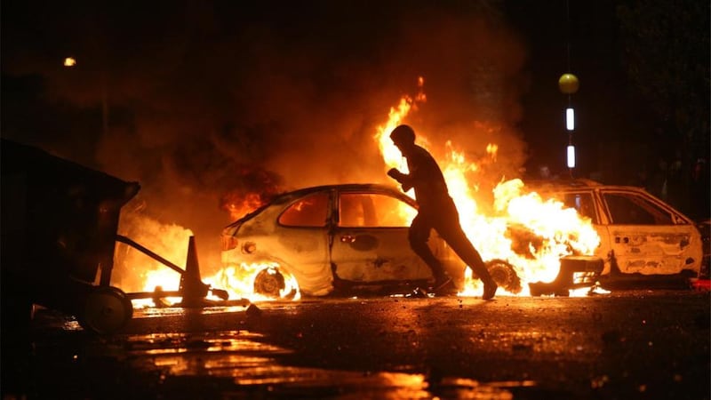 It is the first time the feeder parade past  Ardoyne shops has been blocked. Photographer: Dara Mac Dónaill/The Irish Times