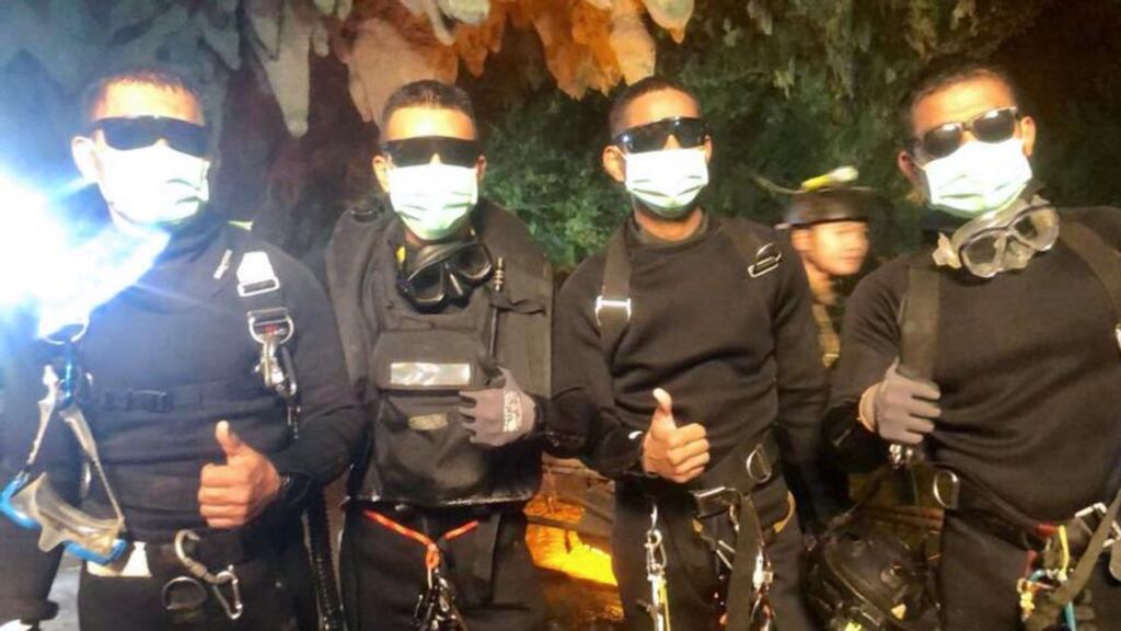 Thai cave rescue: the final four Thai navy Seals after bringing the last of the Wild Boars soccer team and their coach to safety. Photograph: Royal Thai Navy/AFP/Getty