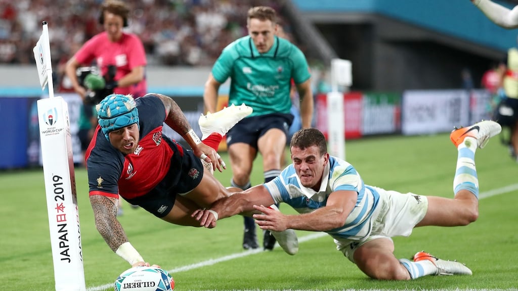 Jack Nowell of England makes a break to score his side’s fifth try during the Rugby World Cup clash with Argentina. Photo: Cameron Spencer/Getty Images