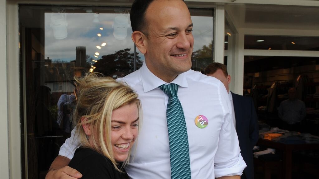 Taoiseach Leo Varadkar poses with a member of the public while canvassing in Rathfarnham on Friday for a Yes vote in the forthcoming referendum. Photograph: Aidan Crawley