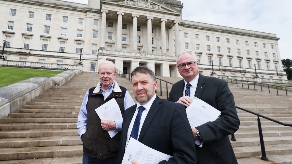 (From left)  Lord Empey, Robin Swann and Steve Aiken of the Ulster Unionist Party outside Stormont Parliment buildings. Photograph: PA