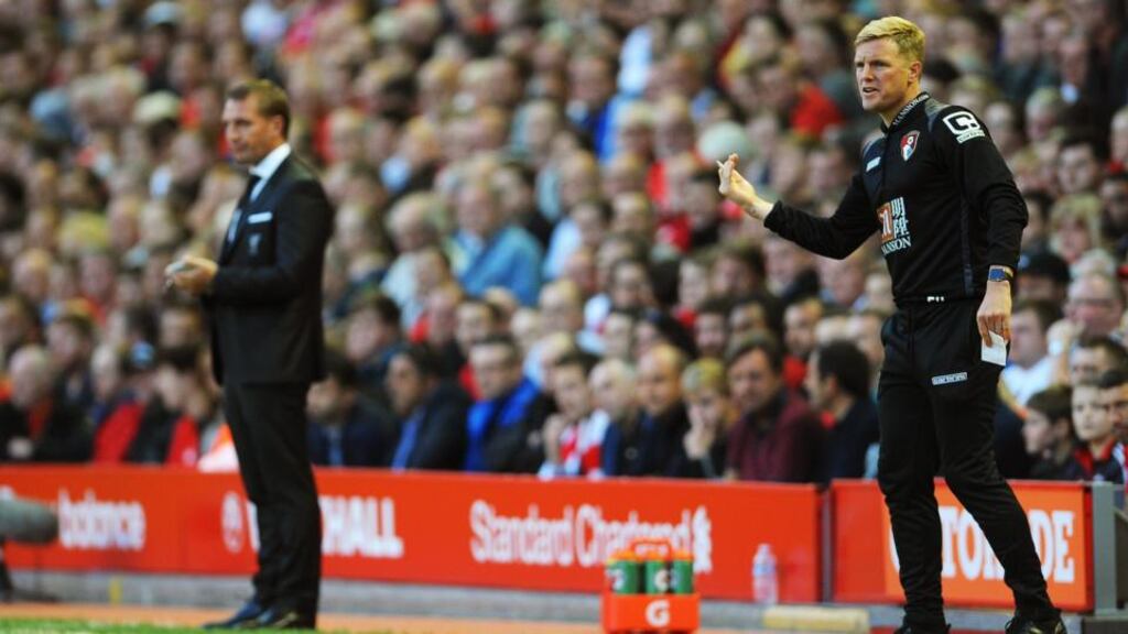 Liverpool’s manager Brendan Rodgers and Bournemouth’s manager Eddie Howe react during the English Premier League soccer match on Monday night. Photograph: EPA