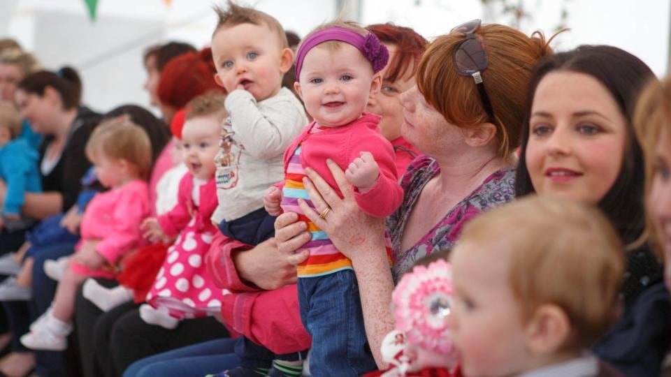 Noah Moran and Genevieve O’Connell wait for the bonny baby competition to start at the Tullamore Show yesterday. Photograph: Jeff Harvey/HR Photo
