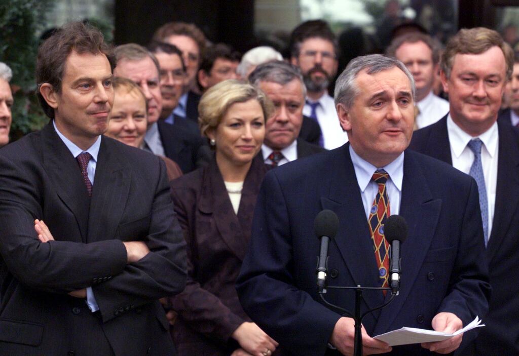 British prime minister Tony Blair listens as taoiseach Bertie Ahern addresses the media on the outcome of the Northern Ireland peace process talks outside Castle Buildings, Stormont, in Belfast in July 1999. Photograph: Paul Faith/PA Wire