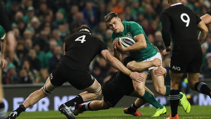 Ringrose is tackled by New Zealand’s Brodie Retallick. Photo: Brian Lawless/PA Wire
