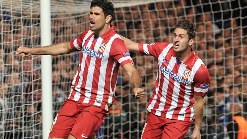 Atlético Madrid’s Diego da Silva Costa (L) celebrates scoring during their Uefa Champions League semi-final second-leg match against Chelsea at Stamford Bridge in London, England. Photograph: Glyn Kirk/AFP via Getty Images