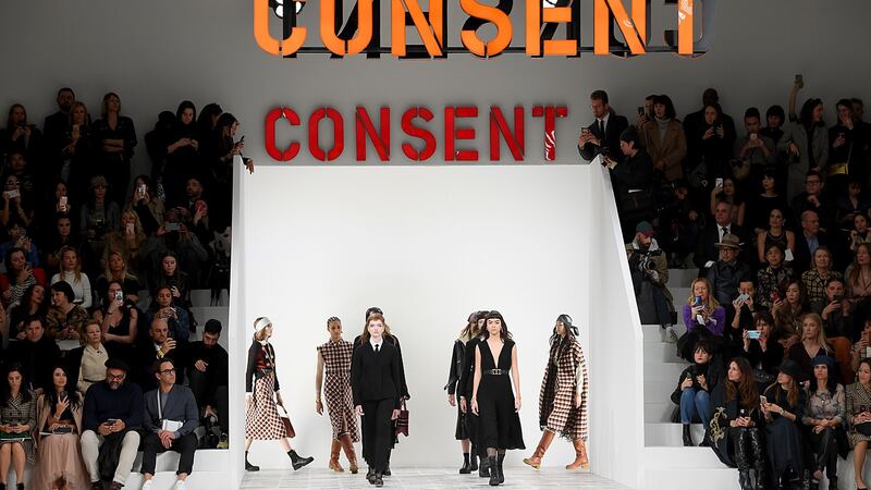 A sign saying Consent at the Dior show in Paris. Photograph: Photo by Pascal Le Segretain/Getty Images
