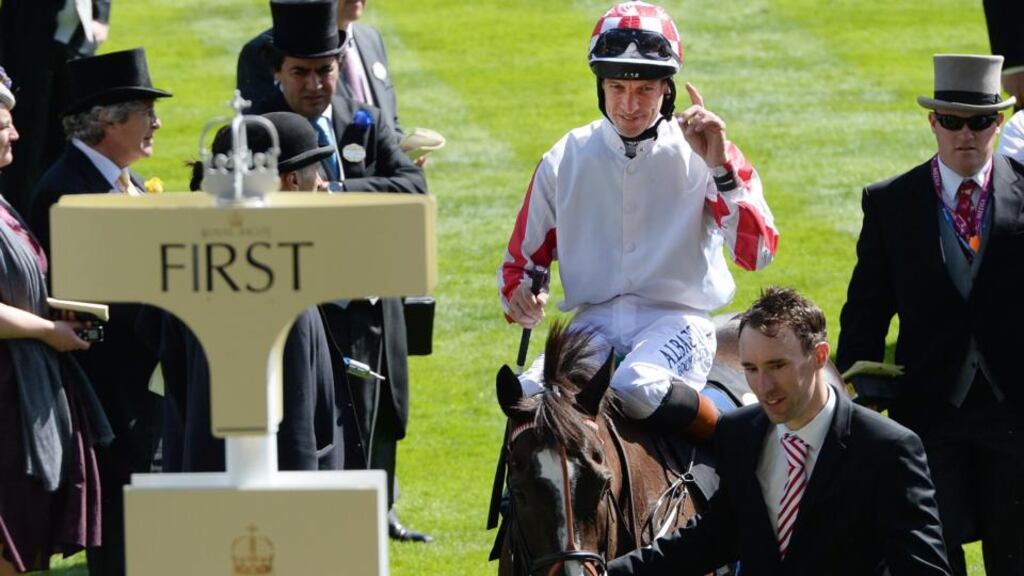Richard Hughes is led into the winner’s enclosure at Royal Ascot aboard speedball sprinter Sole Power. Photograph: Andy Rain/EPA