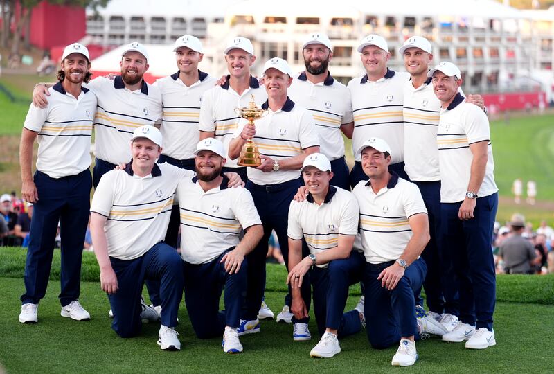 Team Europe pose with the Ryder Cup. Photograph: Mike Egerton/PA