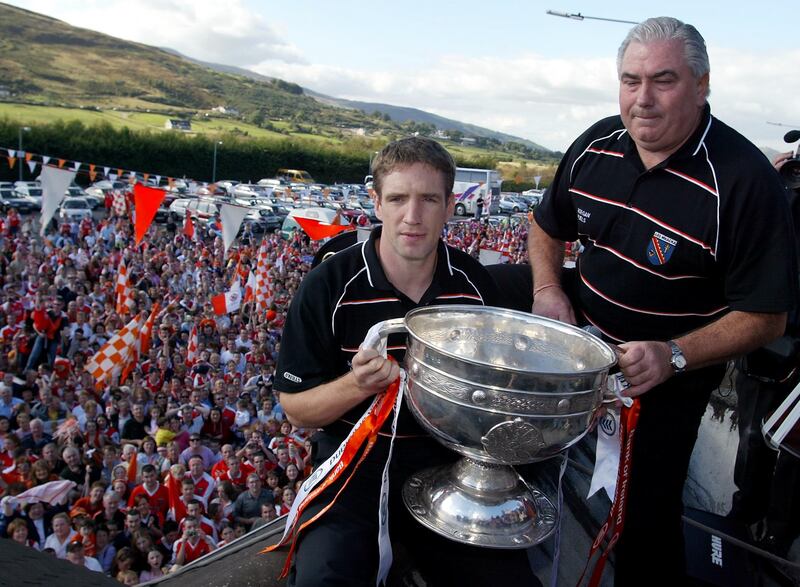 Kieran McGeeney and Joe Kernan with the Sam Maguire Cup at the Carrickdale Hotel. Photograph: Lorraine O'Sullivan/Inpho