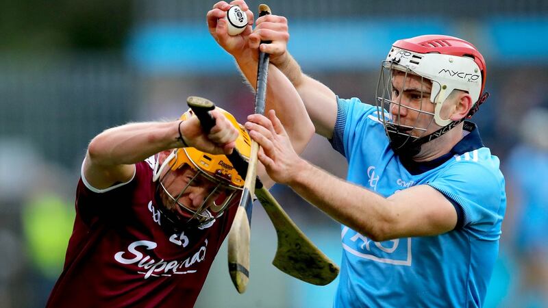 Dublin’s Paddy Smyth challenges David Glennon of Galway during the Leinster SHC round-robin game at Parnell Park. Photograph: Ryan Byrne/Inpho