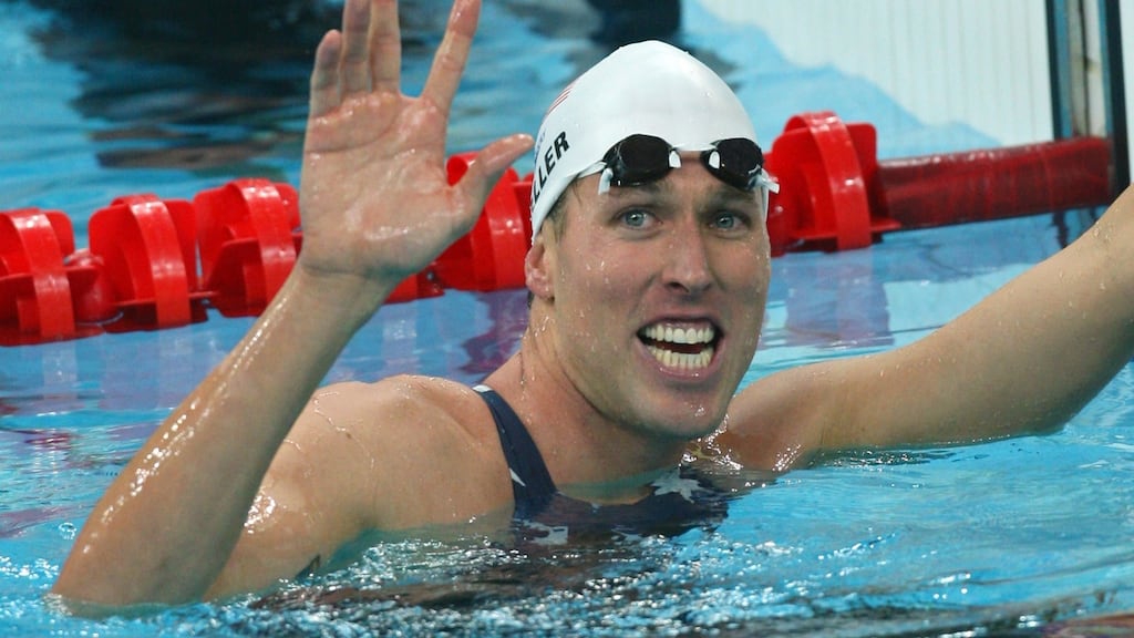 US swimmer Klete Keller smiles after winning the men’s 4 x 200m freestyle relay swimming heat at the National Aquatics Center in the 2008 Beijing Olympic Games. Photo: Greg Wood/AFP via Getty Images