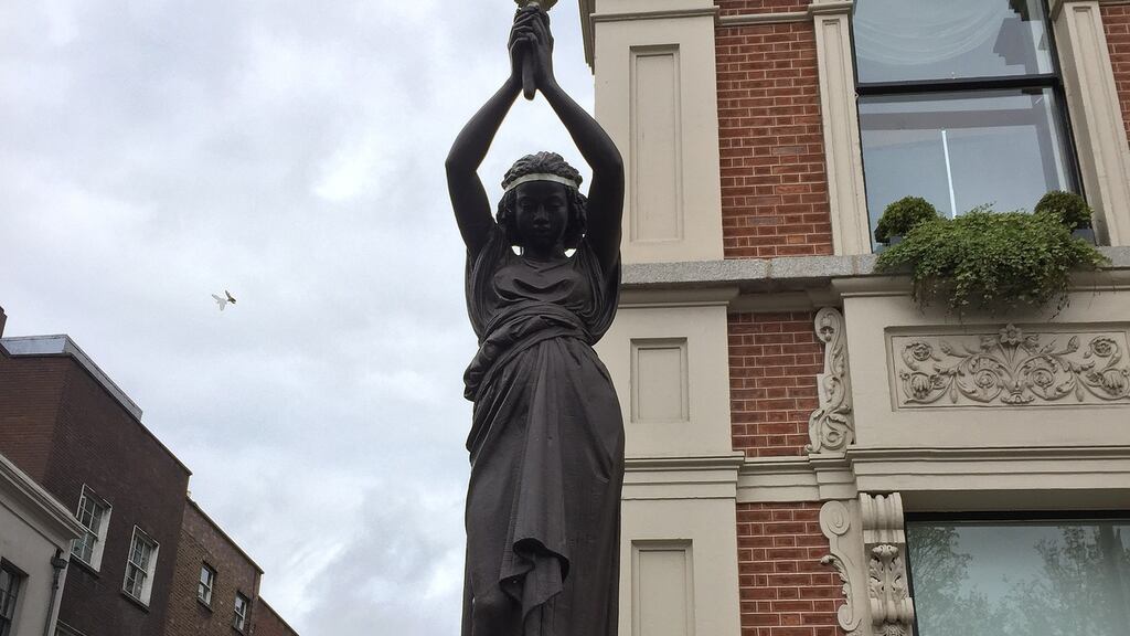One of the statues depicting slave girls holding torches. Photograph: Wikimedia Commons
