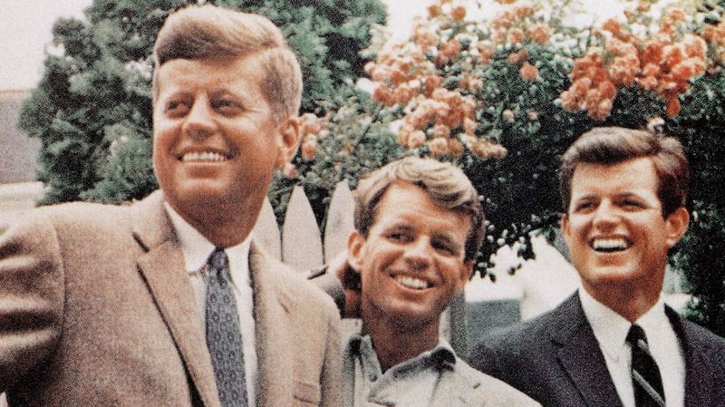 John F Kennedy, left, Robert Kennedy, and Ted Kennedy, right, in Hyannis Port, Mass. Photograph: AP