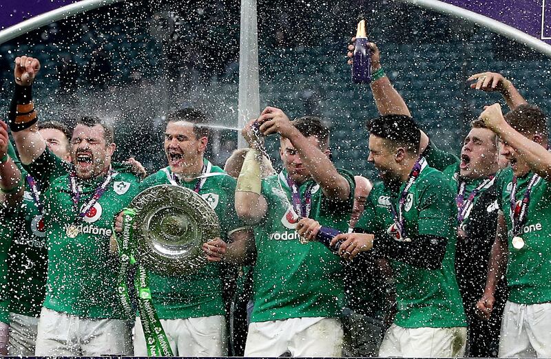 Cian Healy, Johnny Sexton, Peter O'Mahony and Conor Murray celebrate winning the Grand Slam after victory over England at Twickenham in 2018. Photograph: Bryan Keane/Inpho