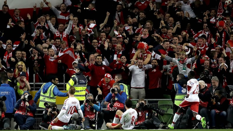 Denmark’s Christian Eriksen celebrates scoring their third goal of the game. Photo: Ryan Byrne/Inpho