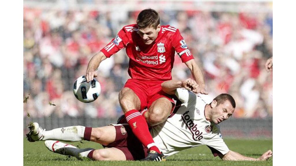 Sunderland's Phillip Bardsley (right) and Liverpool's Steven Gerrard (left) in action during the Premier League match at Anfield. Photograph: Peter Byrne/PA Wire