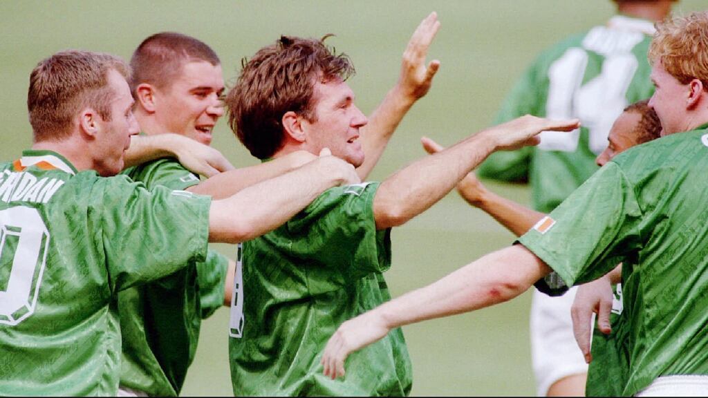The Republic of Ireland’s Ray Houghton (C) is mobbed by his teammates after scoring in the World Cup match between Italy and Ireland in East Rutherford New Jersey on June 19th, 1994. Irish super fan Jim Ryan, who has followed the team around the world, says Houghton’s goals in 1994 and against England in 1988 are some of his most memorable moments. Photograph: Ray Stubblebine/Reuters.
