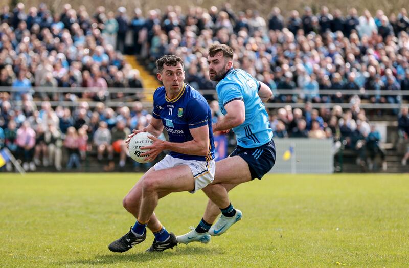 Wicklow’s Pádraig O’Toole holds off Seán MacMahon of Dublin during the sides' Leinster championship match in Aughrim on April 13th. Photographer: Dan Sheridan/Inpho