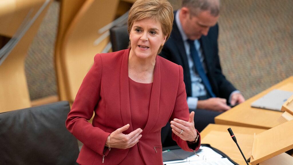 Scotland’s first minister Nicola Sturgeon delivers a statement on the agreement between the SNP and the Scottish Green Party in Edinburgh on Tuesday. Photograph: Jane Barlow/Pool /AFP via Getty Images