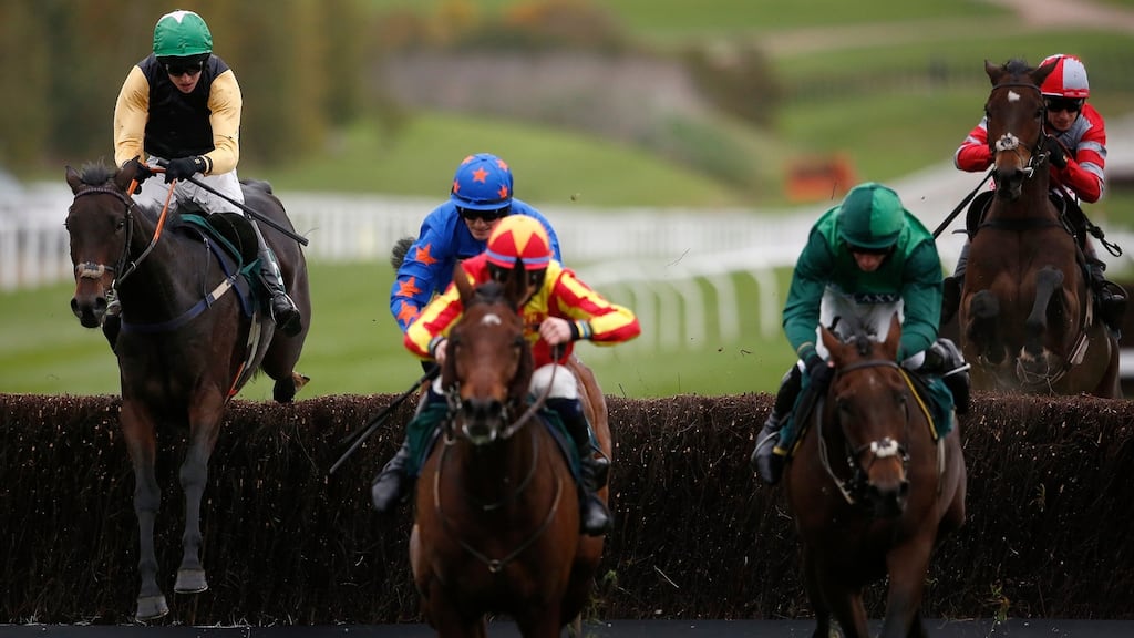 Mark Walsh riding Shantou Flyer (far left) clears the last on the way to winning The Ryman Stationary Cheltenham Business Club Novices’ Steeple Chase at Cheltenham. Photograph: Alan Crowhurst/Getty Images