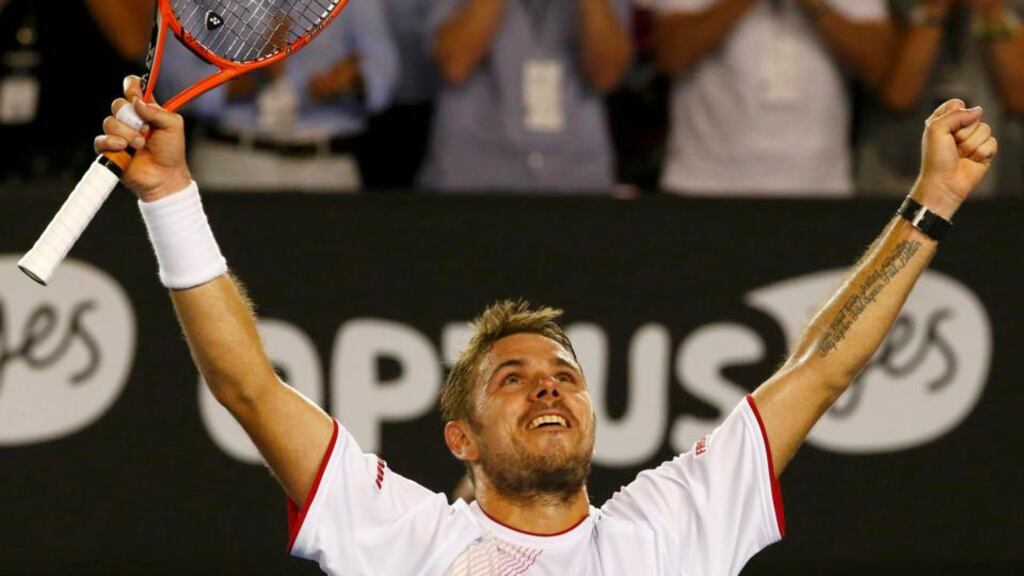 Stanislas Wawrinka of Switzerland celebrates defeating Rafael Nadal of Spain in the final of the Australian Open. Photograph: Petar Kujundzic/Reuters