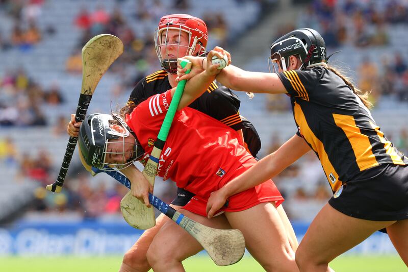 Cork's Amy O’Connor is tackled by Tiffanie Fitzgerald and Kellyann Doyle of Kilkenny. Photograph: Bryan Keane/Inpho