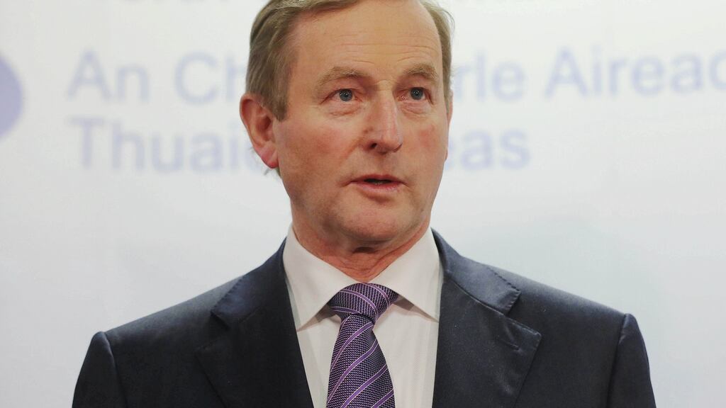 Taoiseach Enda Kenny said a report on paramilitaries in the North raised matters of very serious concern. Photograph: Niall Carson/PA Wire