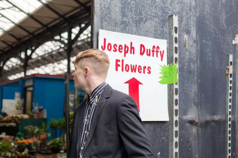 Navy pinstripe floral shirt €5, Age Action, Camden Street, Dublin 8; charcoal suit jacket €5, Age Action; grey suit trousers €10, Oxfam, South Great George’s Street, Dublin 2