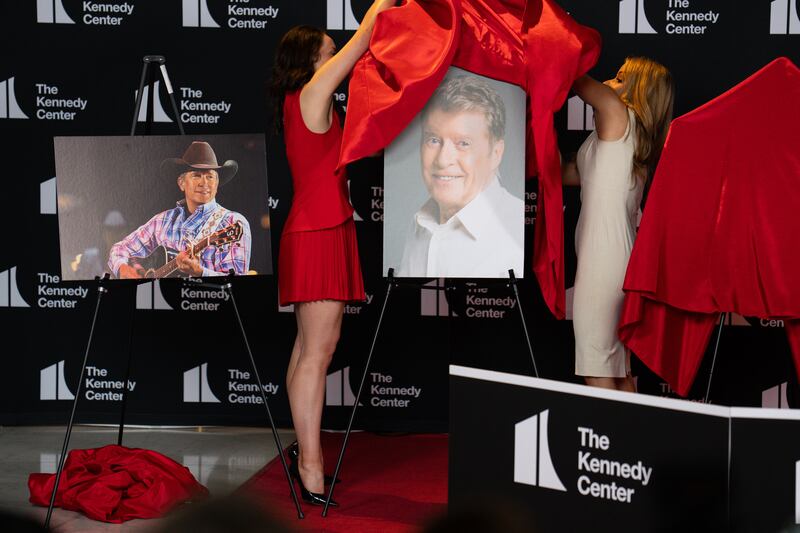 An image of actor Michael Crawford, right, is unveiled at the Kennedy Center in Washington on Wednesday. Photograph: Kayla Bartkowski/Bloomberg