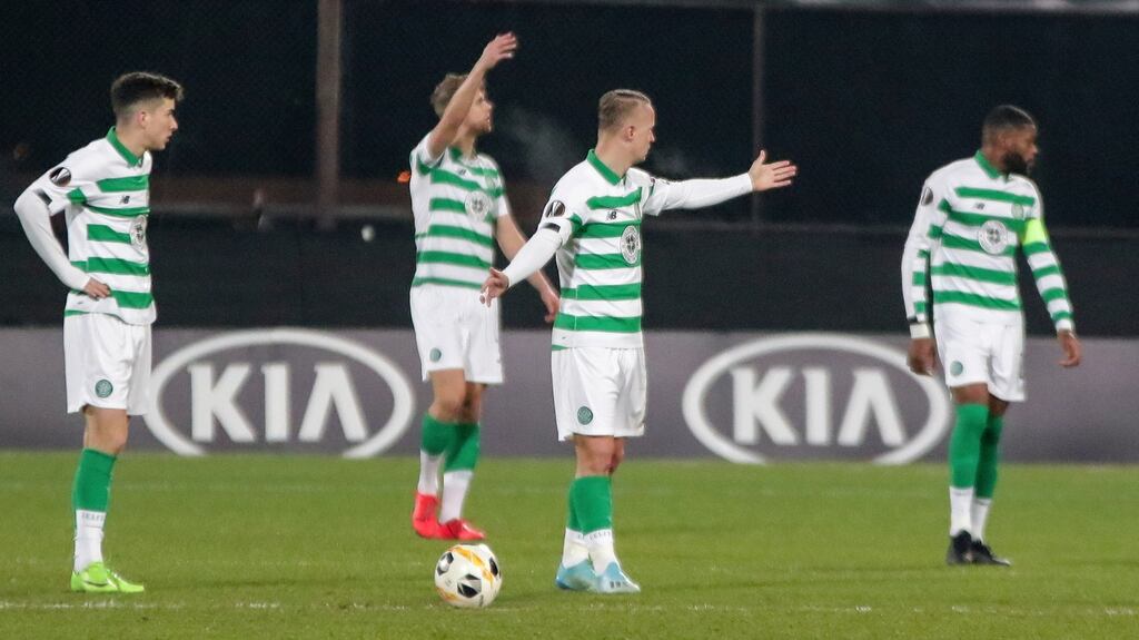 Celtic’s players after CFR scored their opening goal at the Constantin Radulescu stadium. Photograph: AP