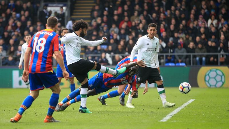 Liverpool’s Mohamed Salah scores his side’s second goal. Photograph: Adam Davy/PA Wire.