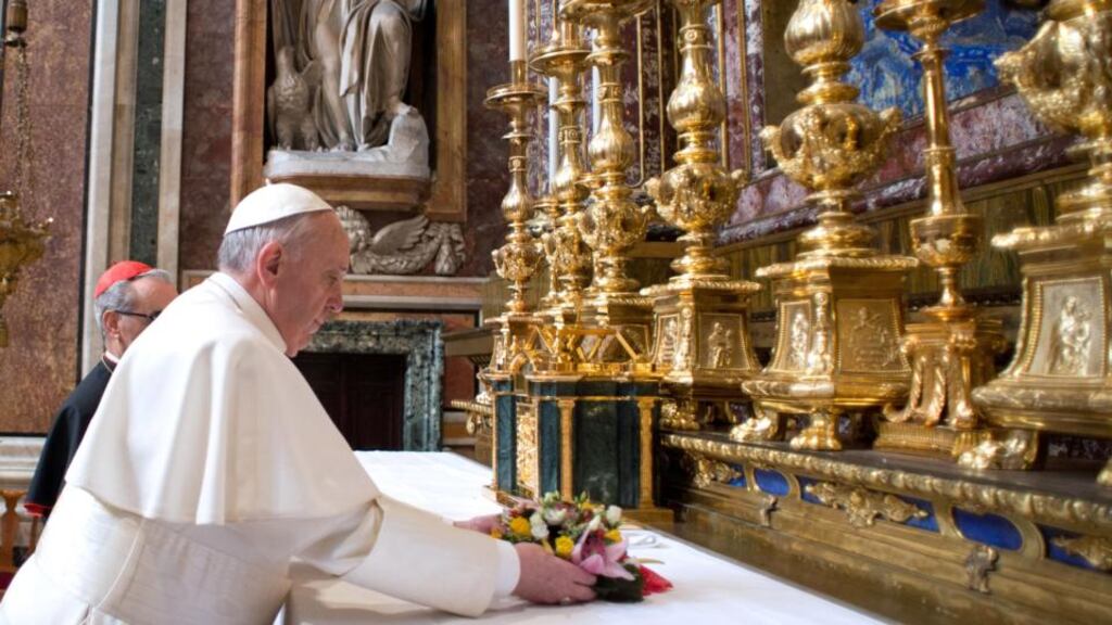 Jorge Mario Bergoglio attends his first private Mass as Pope Francis in the Basilica of Santa Maria Maggiore in Rome yesterday. Photograph: Servizio Fotografico L'Osservatore Romano/Getty Images
