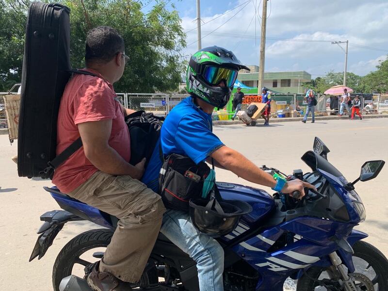 Violin Man heads off to an uncertain future but away from Venezuela, his wife and two children. Photograph: Peter Murtagh