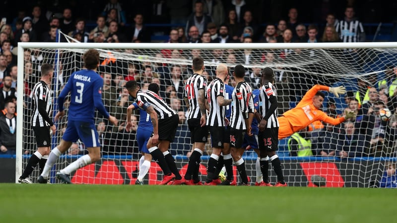 Marcos Alonso scores Chelsea’s third against Newcastle. Photograph: Catherine Ivill/Getty