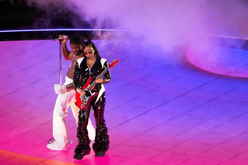 Usher and H..E.R performing during halftime show of Super Bowl LVIII. Photograph: Doug Mills/New York Times