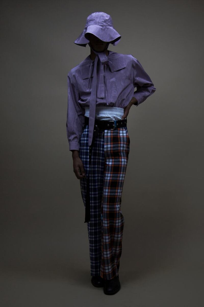 Lilac moire hat and sailor shirt worn with white cotton skirt and check cotton trousers by Rory Parnell Mooney