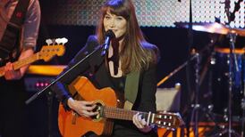 Carla Bruni turns the knife as she lets her music speak for herself