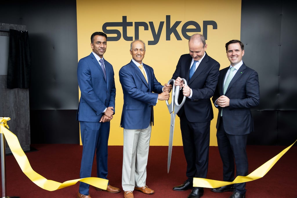 Taoiseach, Micheál Martin, second right, at the official opening of an expansion of Stryker’s Anngrove facility in Carrigtwohill, Co Cork, with, from left, Stryker group president, global quality and operations, Viju Menon; Kevin Lobo, chair and chief executive of Stryker; and IDA Ireland chief executive Martin Shanahan. Photograph: Michael O'Sullivan/OSM PHOTO