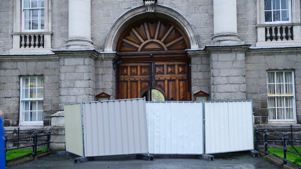 The front gate of Trinity College Dublin was sealed off after a man drove a vehicle into it on April 2nd, 2014. Photograph: Bryan O’Brien/The Irish Times.