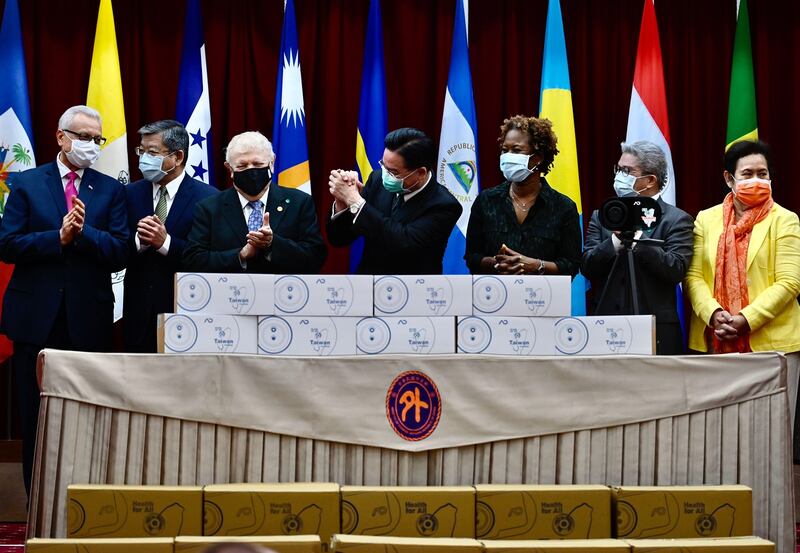 Joseph Wu (centre), minister of Taiwan's foreign affairs, gestures during a ceremony to donate Taiwanese-made thermal scanner devices on April 15th, 2020. Taiwan donated some 100 infrared thermal scanners to 15 of its diplomatic allies. Photograph: Sam Yeh/AFP