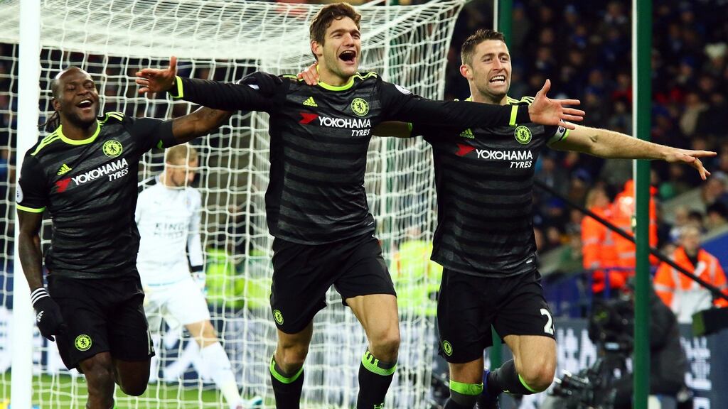 Chelsea’s Marcos Alonso celebrates with his teammates after scoring in their Premier League win over Leicester. Photo: Tim Keeton/EPA