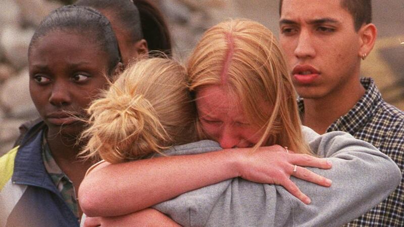 Picking up the pieces: after the Columbine High School massacre, on April 21st, 1999. Photograph: Pamela Salazar/Liaison/Getty
