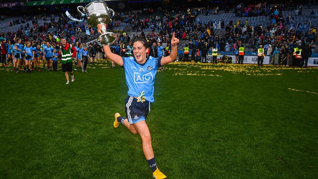 Hannah O’Neill of Dublin celebrates with the Brendan Martin Cup. Photograph: Stephen McCarthy/Sportsfile