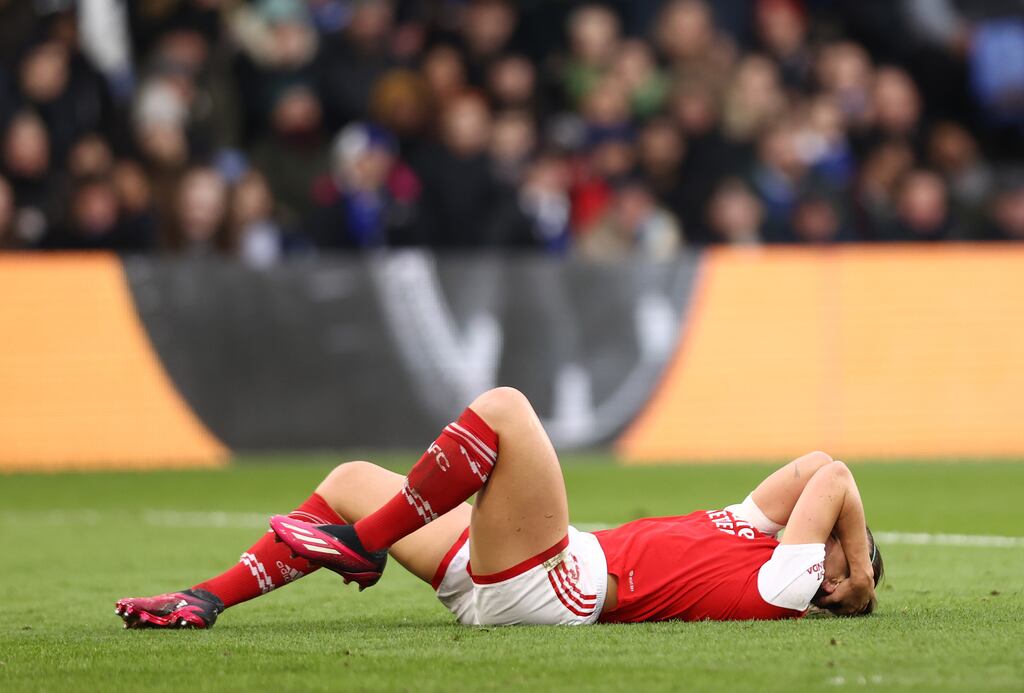 Katie McCabe goes down injured during the FA Women's League Cup final match between Chelsea and Arsenal at Selhurst Park in March 2023. Photograph: Naomi Baker/The FA via Getty Images