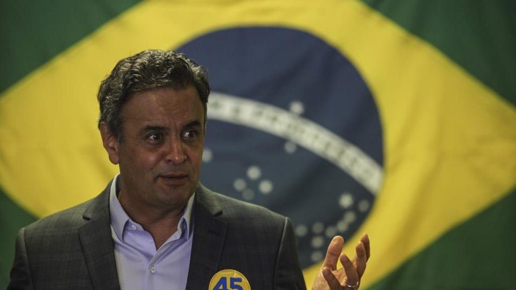 Candidate of the Partido de la Social Democracia Brasilena (PSDB) Aecio Neves during an election campaign rally in Rio de Janeiro. Photograph: EPA/Antonio Lacerda