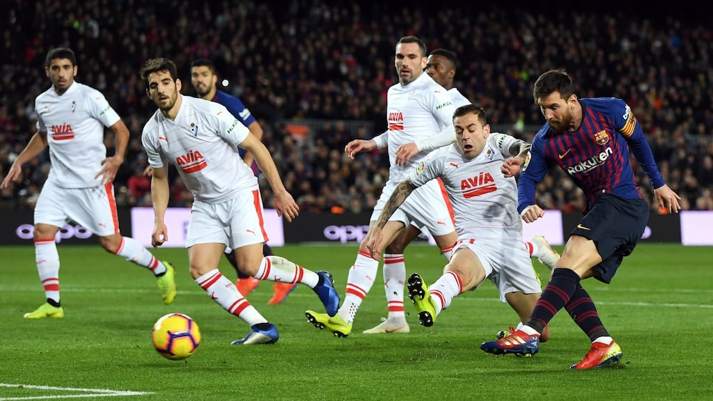 Lionel Messi scores  Barcelona’s second goal and his 400th for the club in La Liga during the game against  Eibar at the Nou Camp. Photograph: David Ramos/Getty Images