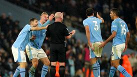 Manchester City fined €140,000 after players surrounded match official
