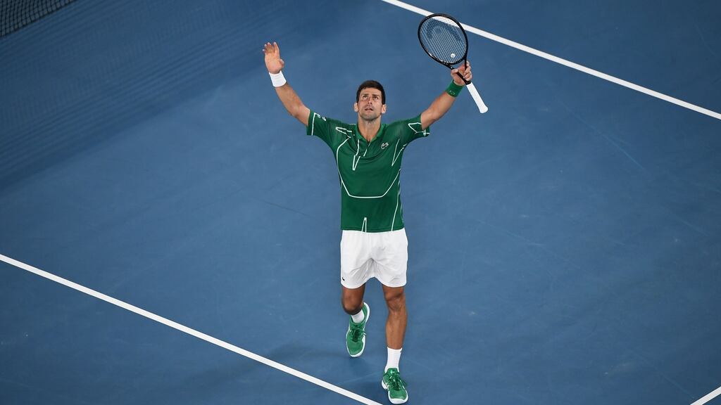 Novak Djokovic celebrates after beating Roger Federer during their men’s singles semi-final match at the Australian Open. Photo: Manan Vatsyayana/AFP via Getty Images
